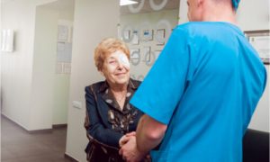 elder woman with eye patch