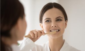 Observe proper oral hygiene to remove plaque.