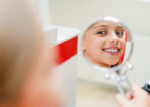 How do cavities develop?